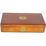 A mahogany campaign style box of brass, steel, wood and other drawing instruments,