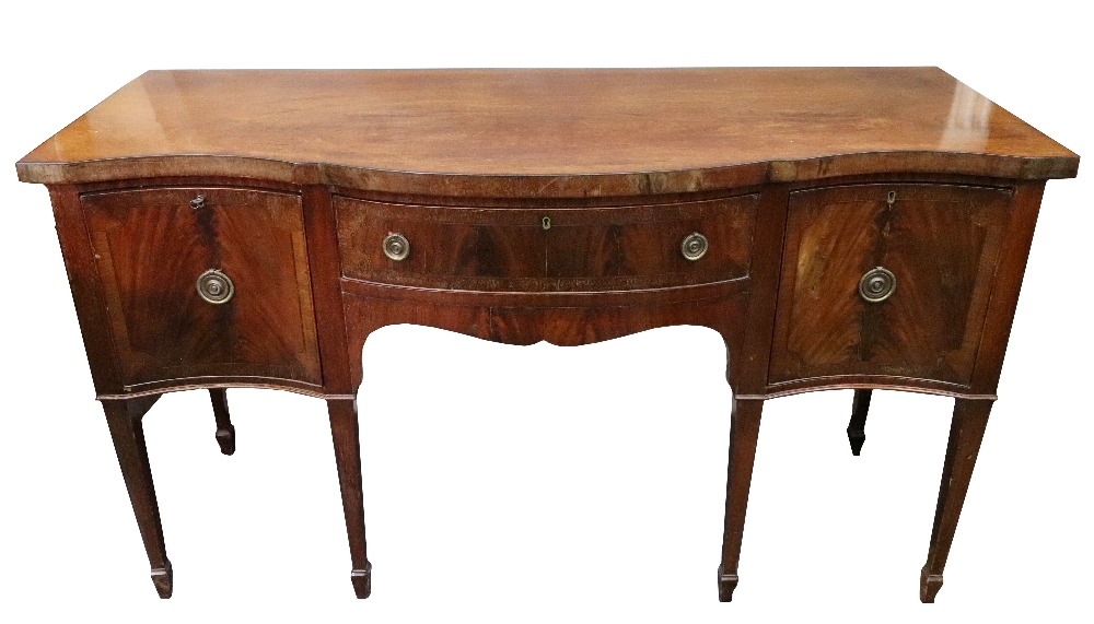 A George III style mahogany boxwood and ebony strung serpentine fronted sideboard, circa 1900,