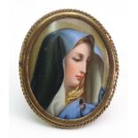 French School, late 19th Century, A portrait miniature of the Virgin Mary, watercolour on ceramic,