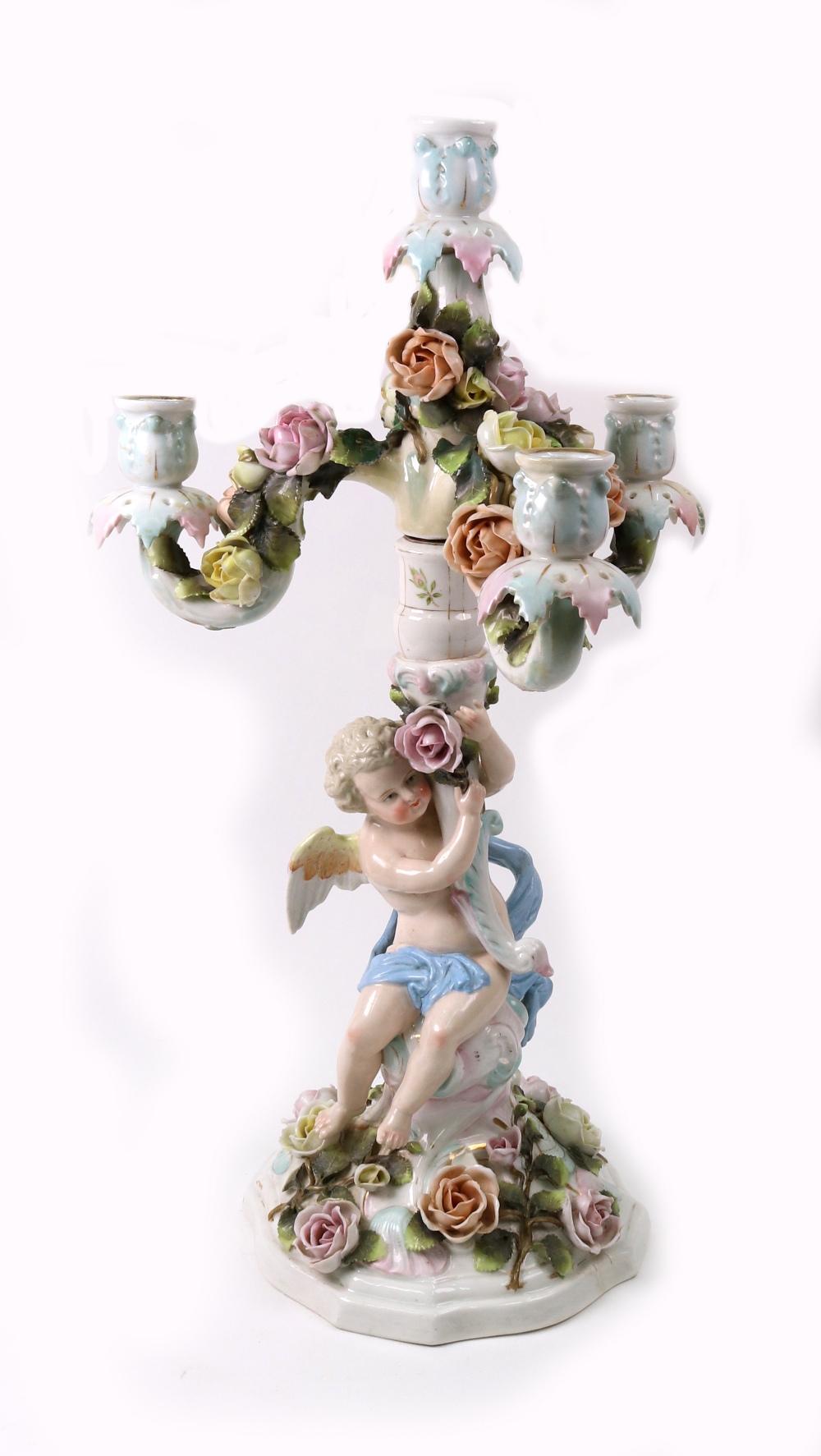 A Sitzendorf porcelain three light candelabrum encrusted with roses, having scrolling branches,