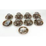 A set of six Japanese Kutani type porcelain coffee cups and saucers, Meiji/Taisho period,