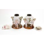 A pair of Sitzendorf oil lamp bases, of rose encrusted basket weave form,