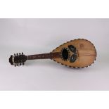 A Mario Casella Cantania mandolin, late 19th century, rosewood boxwood strung,