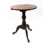 A George III oak pedestal table, the circular tilt-top,