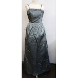 A grey evening dress with button detail, by Susan Small with box.