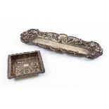 A late Victorian silver narrow shaped rectangular dressing table tray, Chester 1898,
