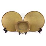A pair of Chinese brass circular trays, circa 1900,