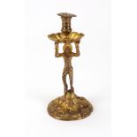 A mid 18th century style gilded harlequin taperstick, 19th century,