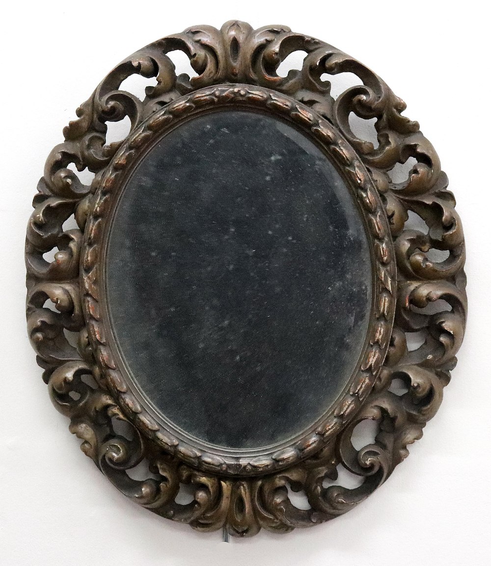 A reproduction 18th century style Florentine oval wall mirror,