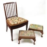 Two reproduction mahogany footstools, in early 18th century style, with tapestry seats,