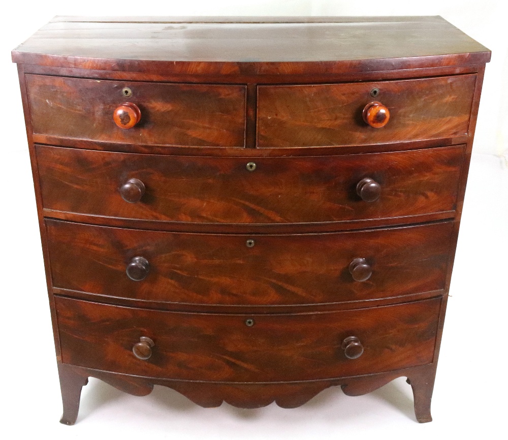 A late George III mahogany bowfront chest,