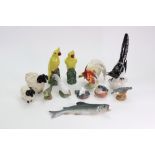 A collection of four Royal Copenhagen porcelain animals including Robin 2266,