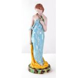 An English parian and majolica glazed figure, circa 1870,