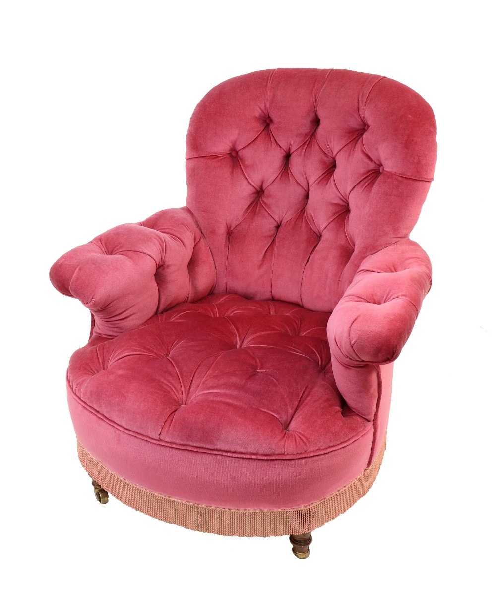 A Victorian button down upholstered armchair, circa 1880, in pink velour,