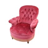 A Victorian button down upholstered armchair, circa 1880, in pink velour,
