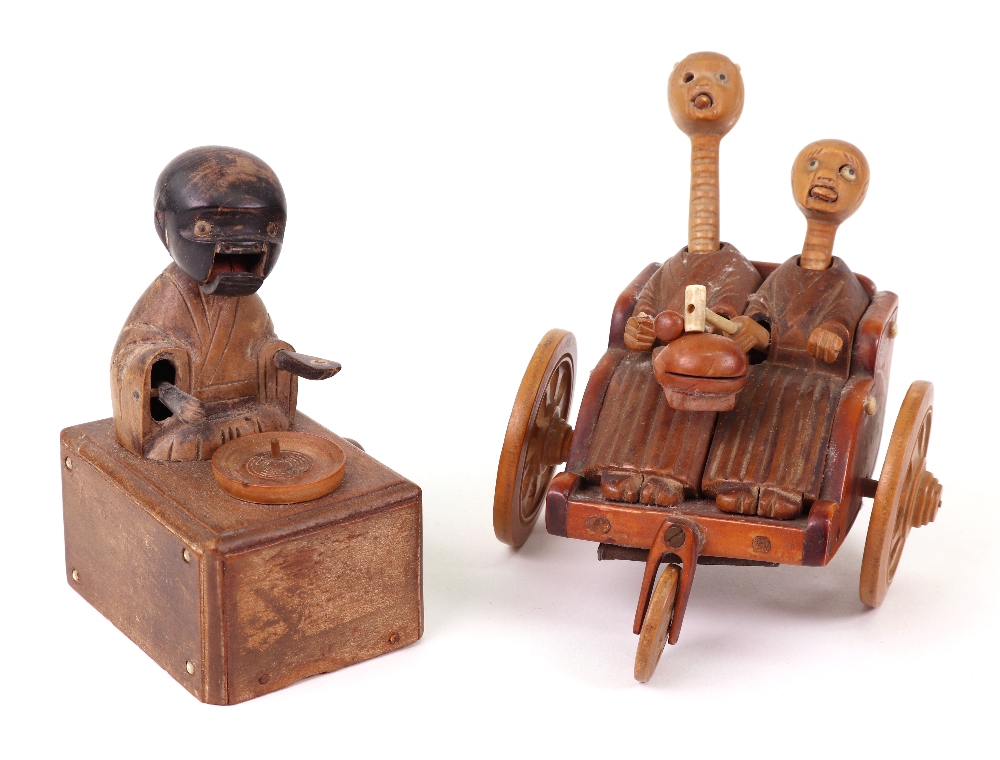 Two carved wooden Japanese Kobi toys,