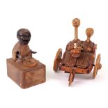 Two carved wooden Japanese Kobi toys,