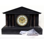 A Victorian black slate marble gilt metal mounted mantel timepiece, in architectural style case,