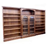An early 20th century oak breakfront library bookcase, in 18th century style,