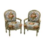 A pair of Louis XVI style green painted frame fauteuil, late 19th century,
