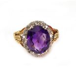 An 18ct yellow gold, amethyst and diamond cluster ring, London 1970,