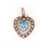 An aquamarine and diamond heart shaped pendant, the open frame set with small old-cut diamonds,
