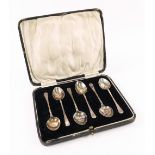 A cased set of six silver coffee spoons, Suckling Ltd, Birmingham 1924, with wrigglework stems.