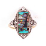 In the manner of Archibald Knox; a gold, diamond and opal shell panel ring, late 19th century,