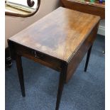 A George III mahogany Pembroke table, with end drawer, on square tapered legs, 76.5cm wide.