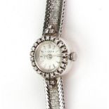 Luxor; a lady's diamond set circular cased bracelet wristwatch,