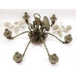 A large wrought metal six light chandelier, first half 20th century, sprayed green and gilt,