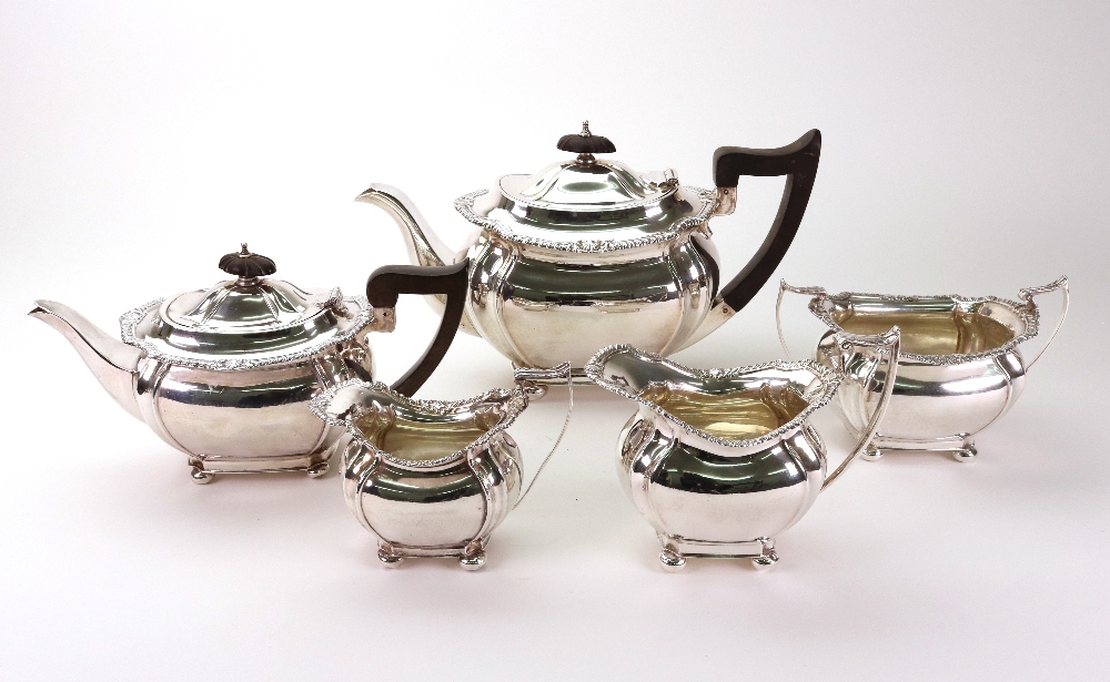 A Regency style silver three piece tea service and matching two piece bachelor service, John Round,