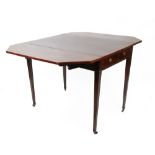 A George III mahogany tulipwood crossbanded boxwood and ebony strung Pembroke table,