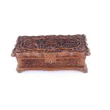 A Chinese sandalwood box, late 19th/early 20th century, of shaped rectangular form,