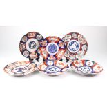 A group of six Japanese Imari plates, Meiji period, including a pair,