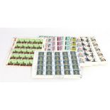 Great Britain: 30 half sheets plus one row to the side of the gutter of mint stamps,