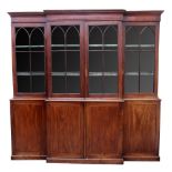 A George III mahogany boxwood strung breakfront library bookcase,