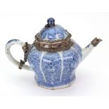A Chinese silver mounted octagonal blue and white teapot and cover, the porcelain Kangxi,