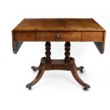 A Regency rosewood sofa table, with single frieze drawer, hinged drop leaves,