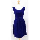A royal blue cocktail dress with wrap-over front.