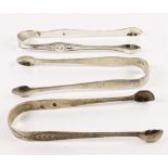 Three pairs of George III silver bright cut engraved sugar tongs, one pair, William Sumner,