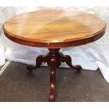 A Victorian mahogany breakfast table, circa 1860, the circular tilt-top,