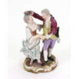 A Meissen porcelain group modelled as a young lady and gentleman dancing, late 19th century style,