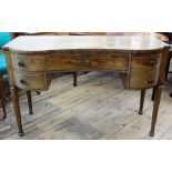 A Regency mahogany ebony banded sideboard, in the manner of Gillows, of shaped outline,