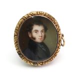 English School, early 19th Century, A portrait miniature of a gentleman in a black coat,