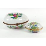 Two Porcelaine de Paris egg shape boxes, floral and fruit decorated, 20 & 12cm wide respectively.