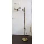 A modern brass cylindrical column adjustable floor standing lamp and shade,