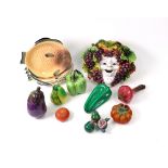 A collection of ten pieces of contemporary pottery and coloured glass models of fruit and