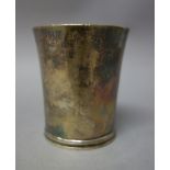 A George III silver beaker, of tapered cylindrical form, height 8.3cm, London 1790, weight 130 gms.