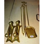 A group of three 19th century brass fire tools and brass fire dogs, (5).